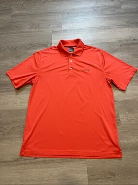 Greg Norman Collection Bright Orange Polo with Embroidered Shark Logo